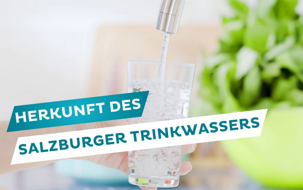 Glas frisches Trinkwasser wird eingeschenkt.